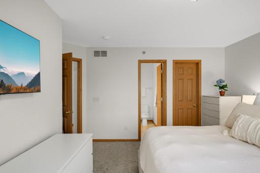 Primary offers walkthrough to full bath and large walk-in closet