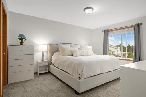 Primary bedroom with walk-in closet.