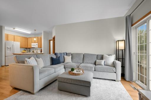Photo of living room with old appliances to show how furniture can fit in this home nicely.