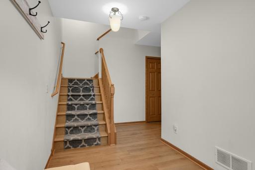 Foyer entry and mechanical room and access to garage. NEW WHIRLPOOL WASHER AND DRYER DELIVERED WEEK OF 9/13!