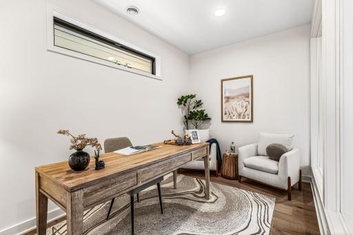 Glass encased private office makes for a great den, too!