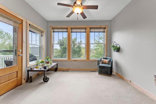 The sunroom walks onto the deck. 1137 Pioneer Trail, Bayport, MN