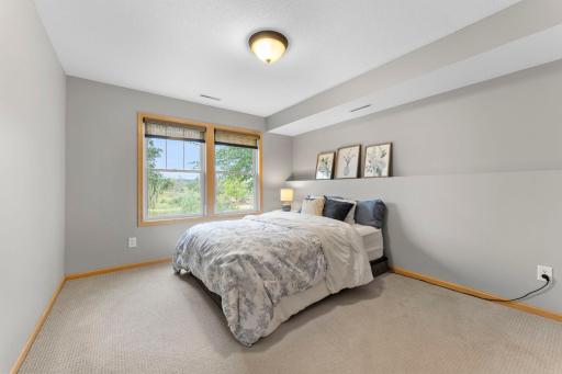 The 2nd of two lower level bedrooms with nature views. 1137 Pioneer Trail, Bayport, MN