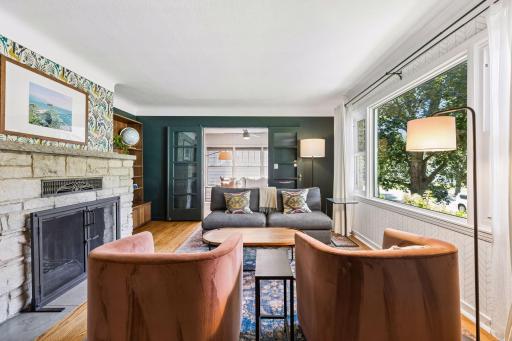 Another view of the living room which is open to the sunroom