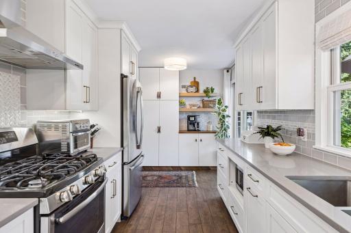 High End GE Stainless Steel Appliances in the the kitchen make meal preparation a pleasure
