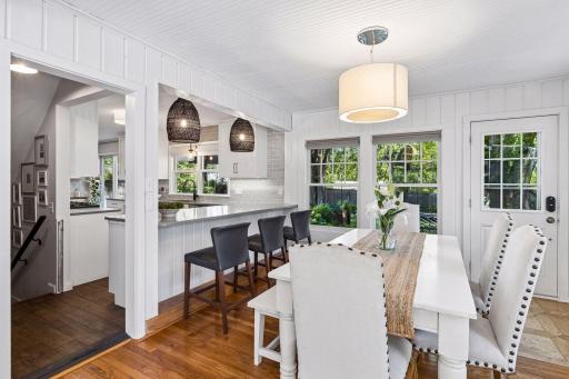 The kitchen is open to the dining room and sunroom, it's a great space for entertaining and allows easy outdoor access