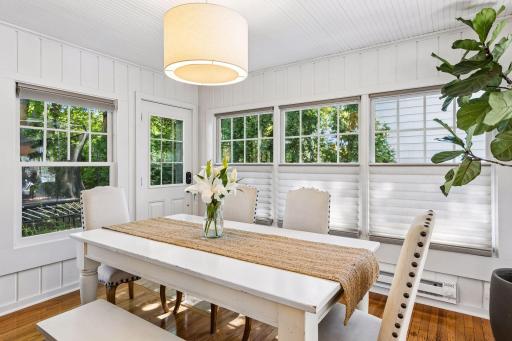 The spacious dining room with automatic shades