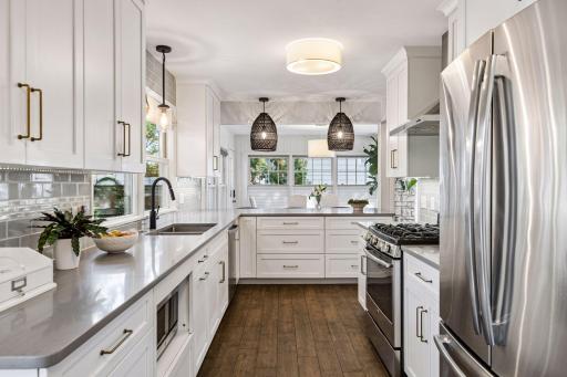 Stainless steel appliances and quartz countertops