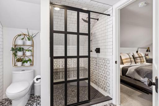 The large shower with designer tile and a rain shower head are a fabulous recent addition