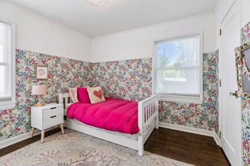 There are two lovely main floor bedrooms with extra storage and beautiful hardwood floors