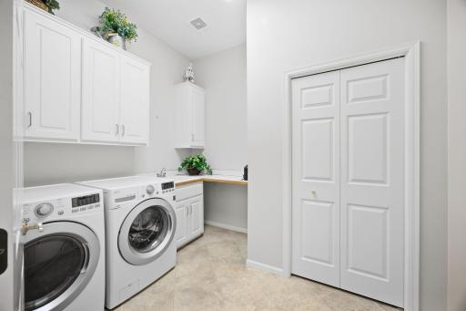 Main floor laundry with updated flooring.