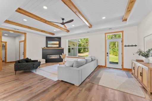 Stunning wood-beamed cove ceiling adding warmth and character.