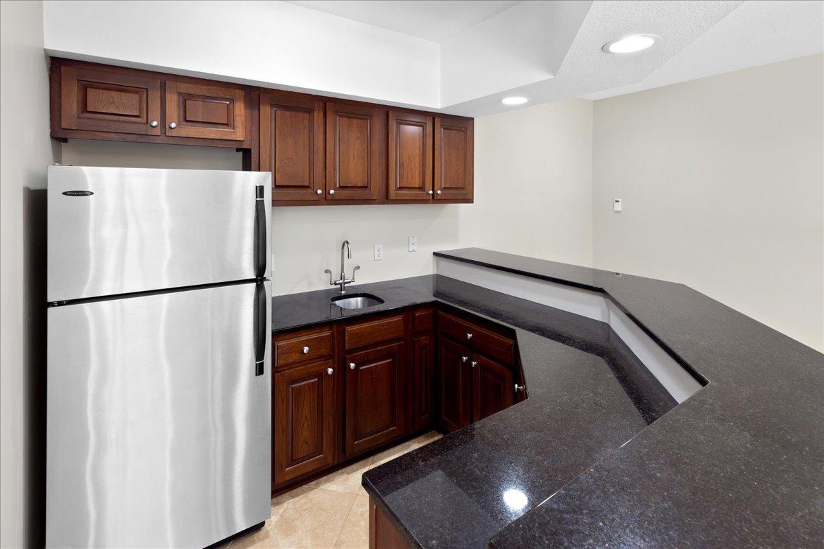 Lower Level Kitchen - Imagine Hosting Here. Now Imagine Owning It