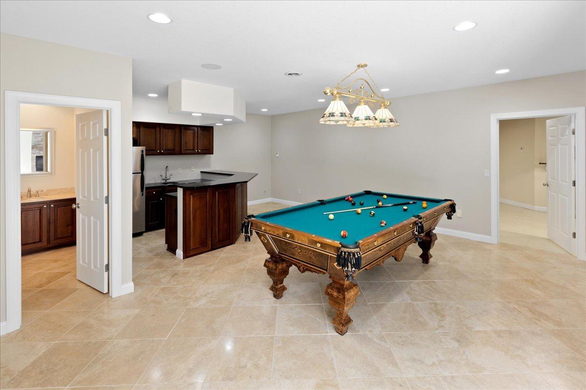 Recreation Space offer in floor heating with Porcelain tile floors - - What If Your Basement Was the Most Impressive Room in the House?