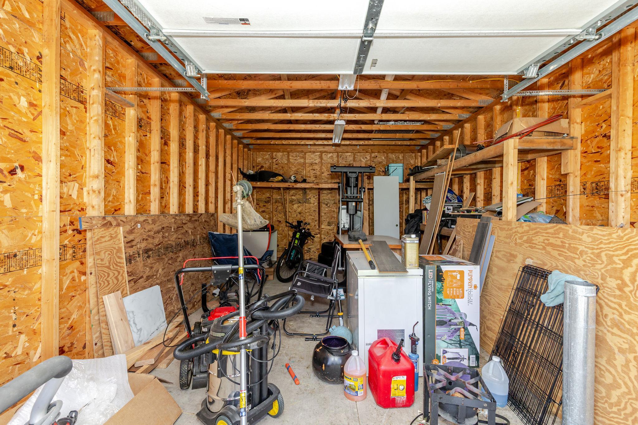 Storage Shed w/ overhead door