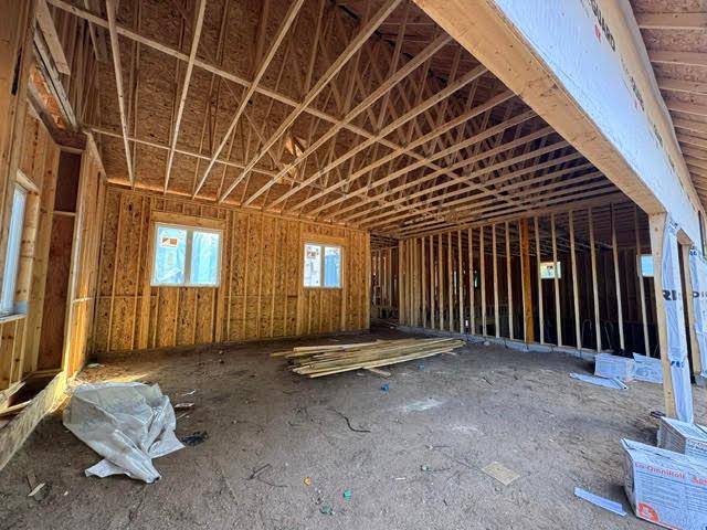 Oversized 3 stall garage with tall ceilings