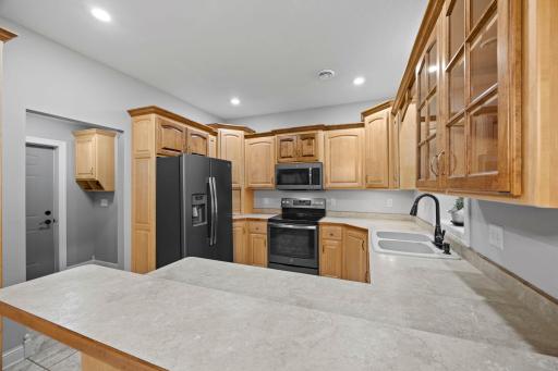 perfectly layout kitchen for cooking and enjoying the back yard views