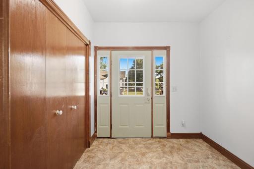 Spacious front entry hall has a large closet.