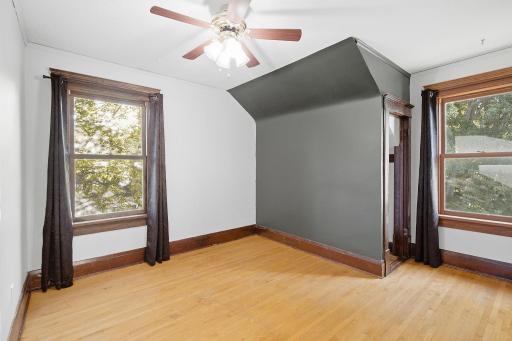 One of three upper level bedrooms has a walk-in closet.