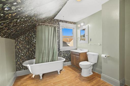 Vintage tub and built-in medicine cabinet add to the character.