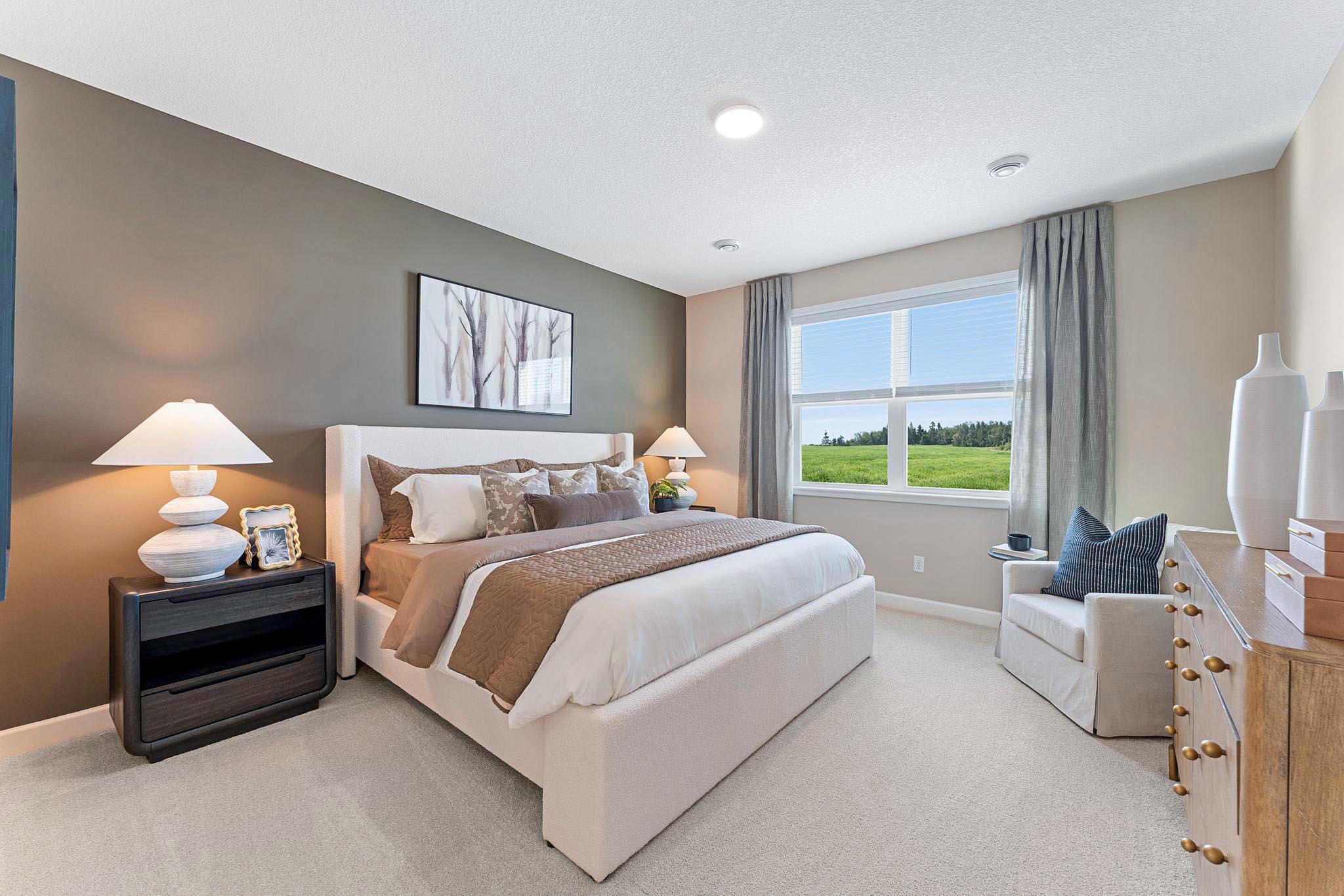 A tranquil haven, the private owner’s suite boasts the largest bedroom in the home to provide restful nights and relaxation, an en-suite bathroom and oversized walk-in closet fit for any fashion enthusiast.