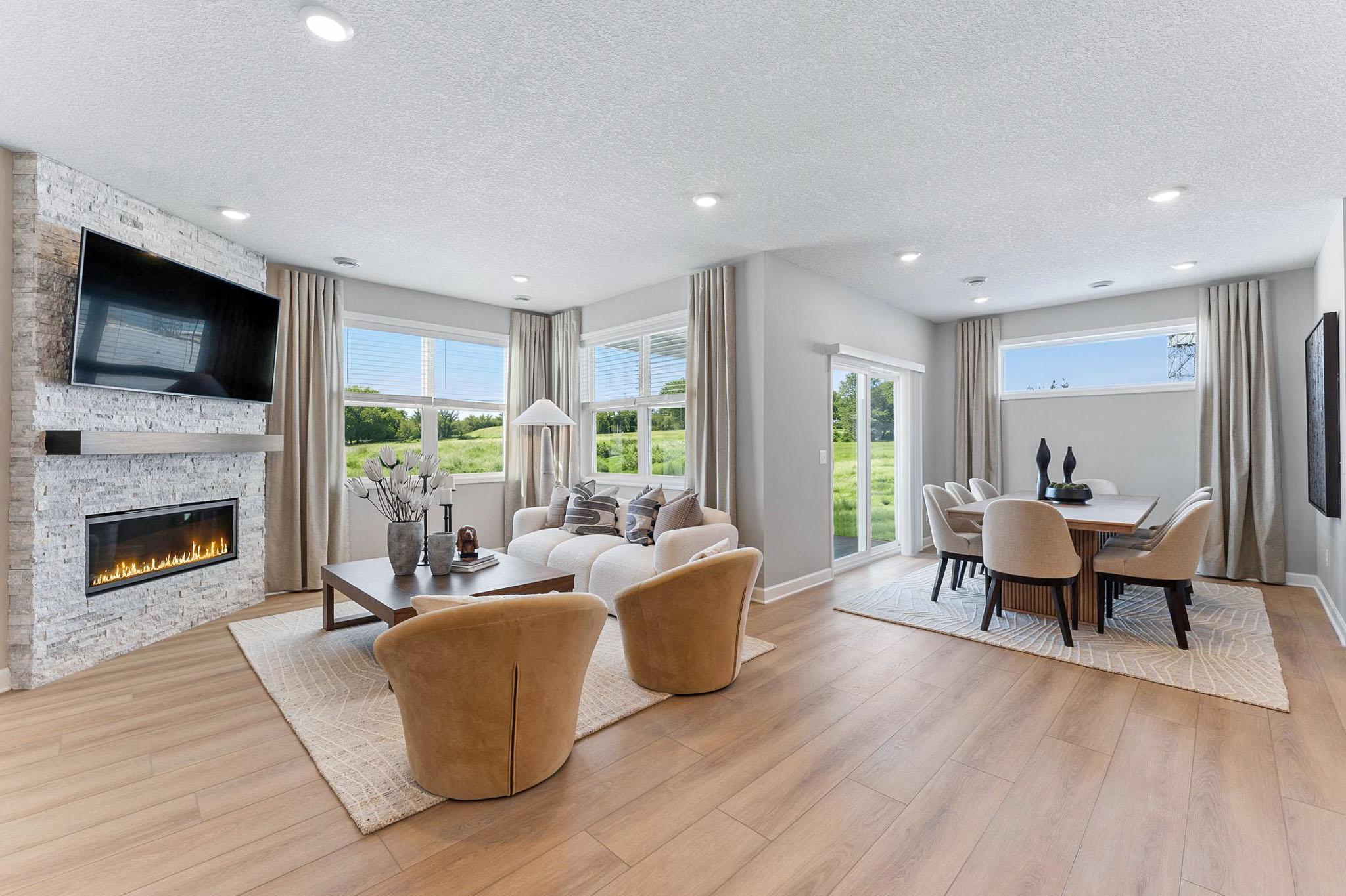 The Great Room is the heart of this home, where the family gathers to watch movies, enjoy leisurely weekend activities and laugh loudly together. An optional fireplace can be added to warm up the space.