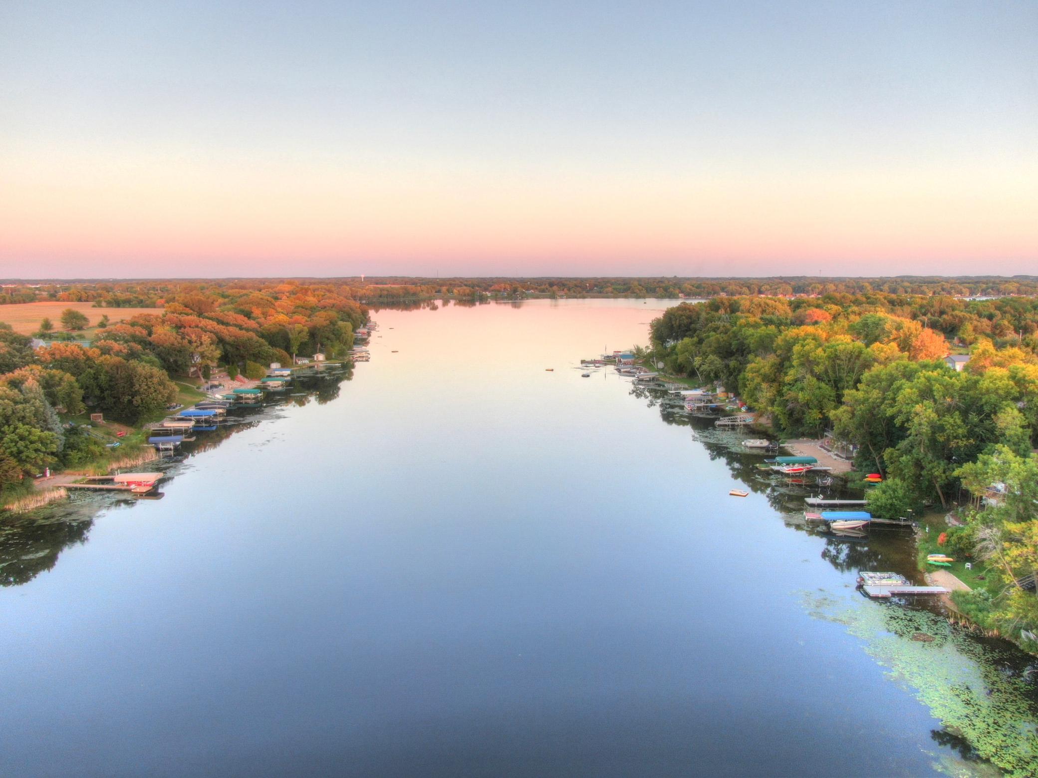 View looking East from the property down the finger bay of Lake John out towards the main lake. It is hard to find a acreage lake lot without any HOA on a high quality lake. Schedule your private showing today!