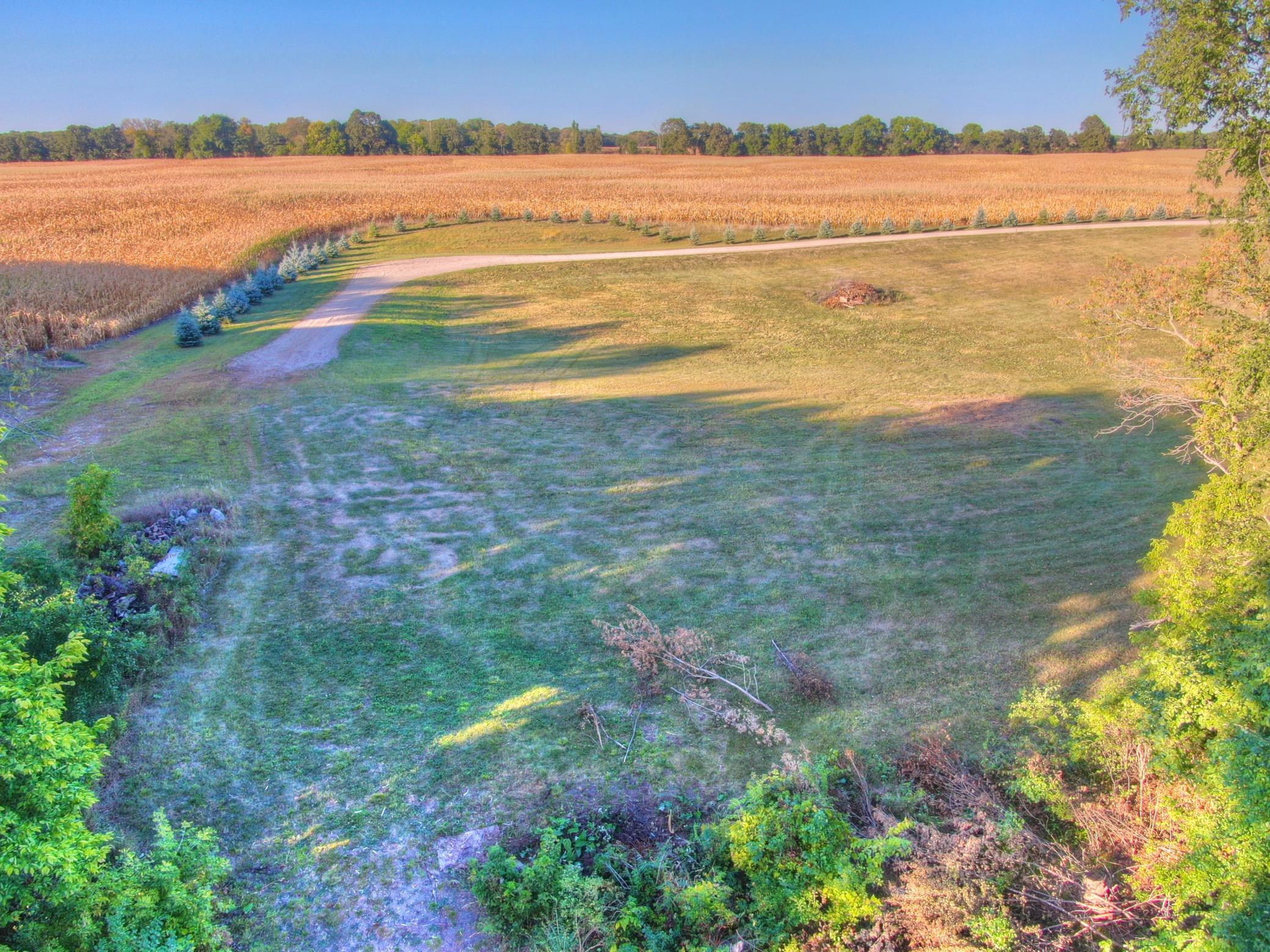 View from the cleared area near the shoreline looking North towards one of the potential build sites. Sellers have put many hours into prepping the lot for them to build their forever home, now it is a canvas ready for you to create your dream home!