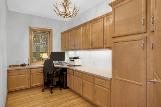 Convenient first floor office with custom maple cabinetry