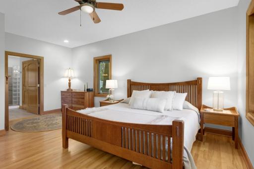 Primary suite has beautiful wood floors