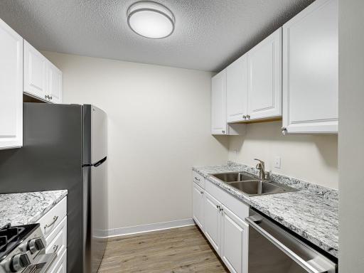 The kitchen also has a new sink and counters!