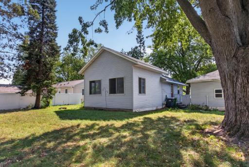 Affordable rambler with large flat backyard
