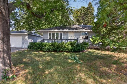 Affordable rambler with large 4 season porch addition