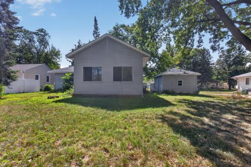 Affordable rambler with large flat backyard