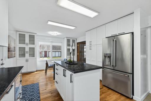 The kitchen is modern with high quality appliances
