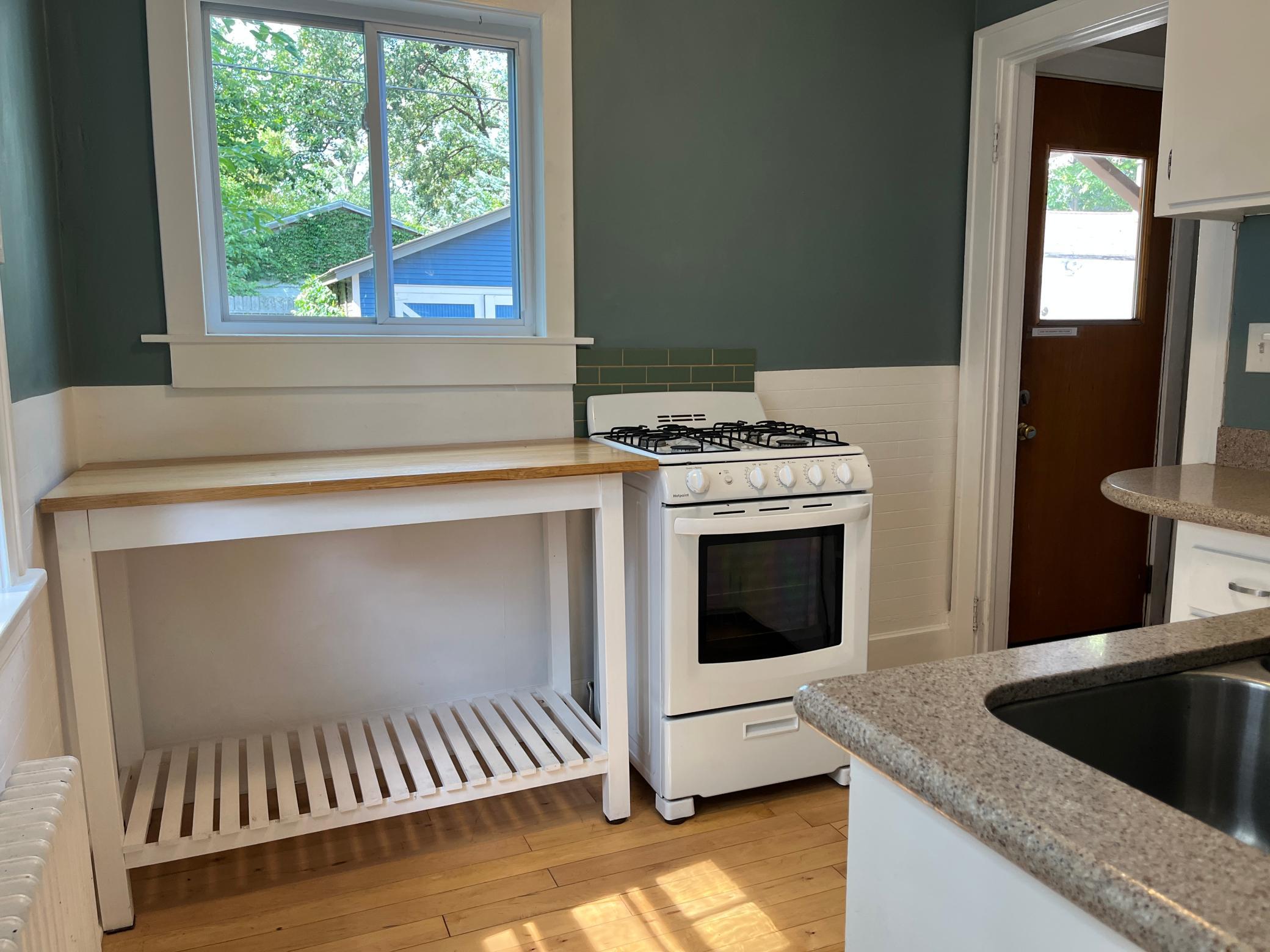 Bright kitchen via southern and western exposure.