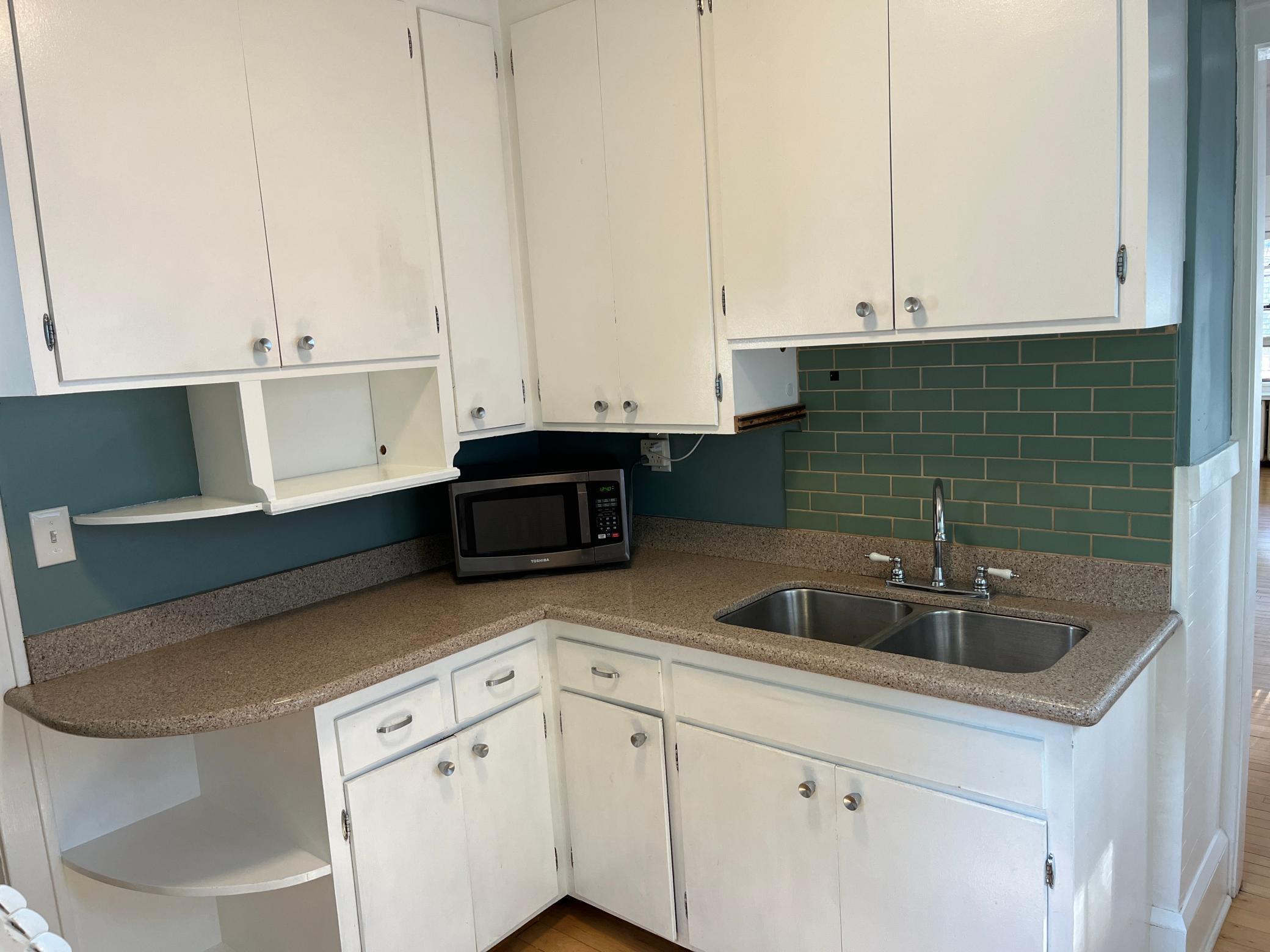 Ceramic tile backsplash.