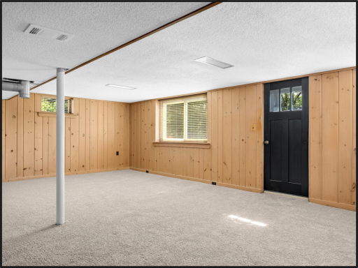 Lower walkout recreation room with new carpet