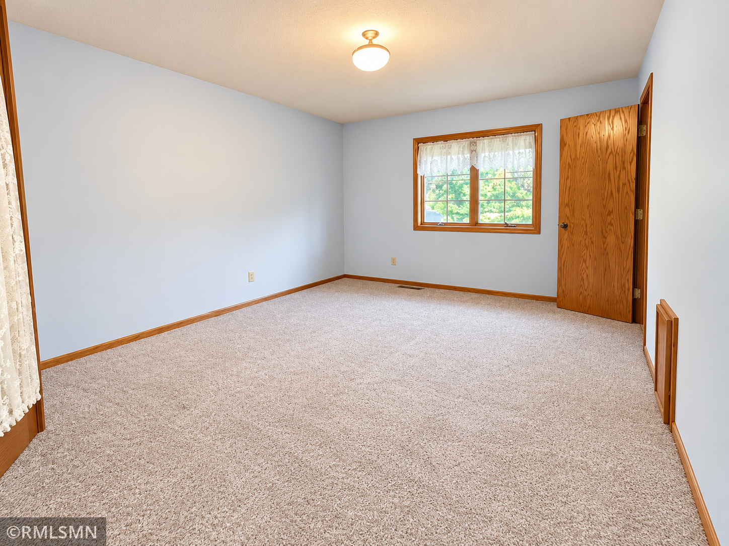 Primary bedroom with new carpet!