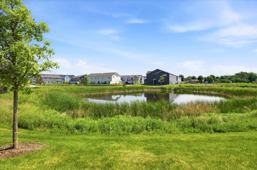 Pond and Wetland in the rear of the home, directly behind your extended driveway AND your balcony view.