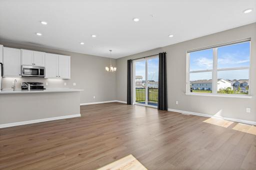 Dining room, living room and kitchen all flow together nicely. Perfect for entertaining!