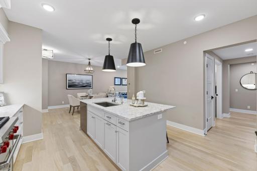 Beautiful hardwood floors throughout the main areas of the unit