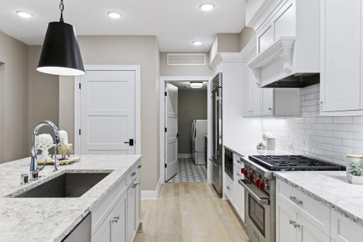 Kitchen features pantry and access to the laundry room