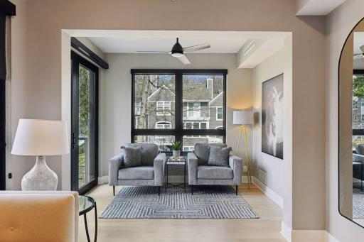 Embrace the warmth and natural light in the sunroom. Easy access to the outdoor patio