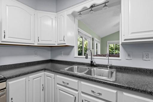 See through area in kitchen looking in 4 season porch