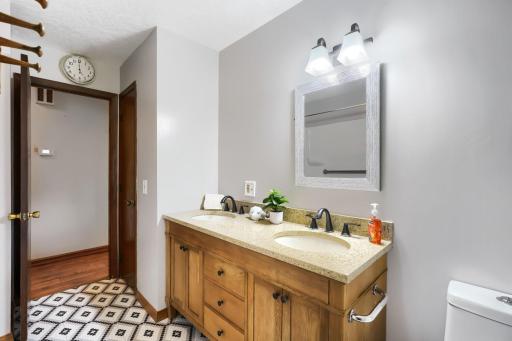Full Bath with newer updates located on upper level.