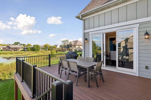 Spectacular pond views set the stage for this oversized maintenance free deck, offering plenty of room for outdoor dining, entertaining, and enjoying the beauty of every season. Ideal picturesque water views to relax and unwind.
