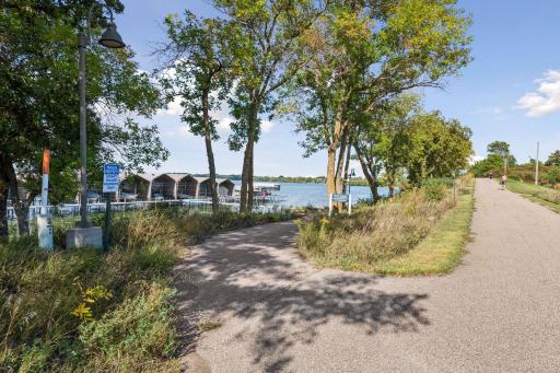 Legacy Village path and entrance to 12 private boat slips with docks to hold your watercraft. #9 slip belongs and deeded with 816 Beach Rd. Private gate entrance with key for entry.