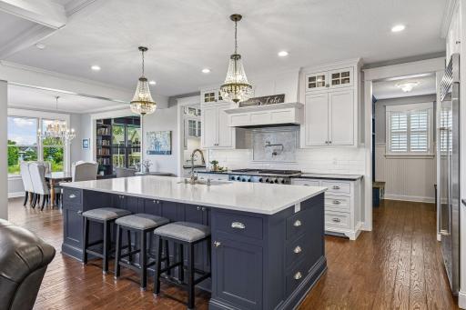 Plenty of space to gather in the heart of the home! This kitchen has it all! Enjoy the pot filler on the wall of ease of cooking, stunning tiled backsplash to compliment the beach or coastal vibe. Very bright and cheerful home to live everyday life