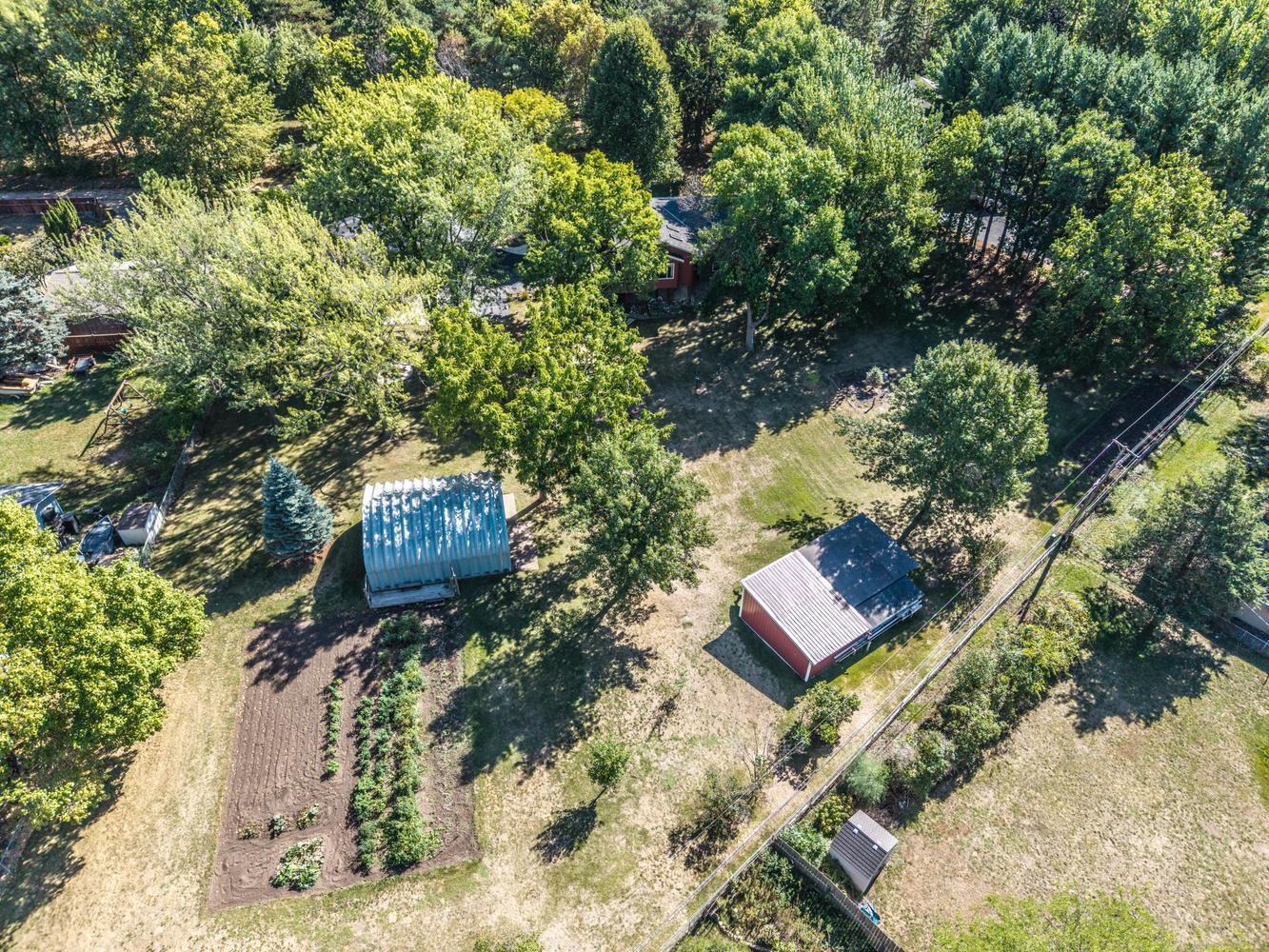 Abundant outbuilding space offers room for vehicles, equipment, hobbies, and outdoor gear.